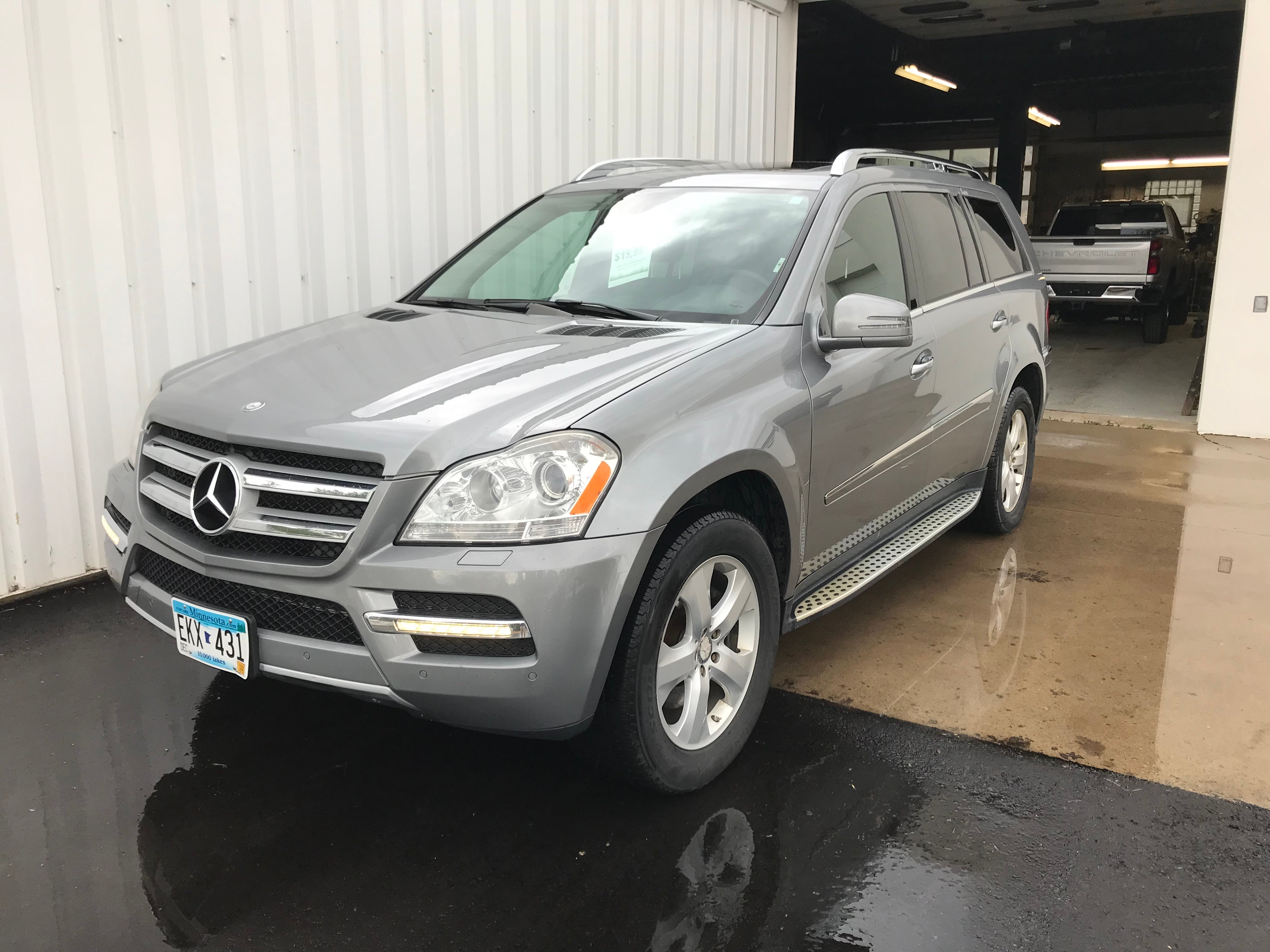Used 2012 Mercedes-Benz GL-Class GL450 with VIN 4JGBF7BE8CA777268 for sale in Arlington, Minnesota